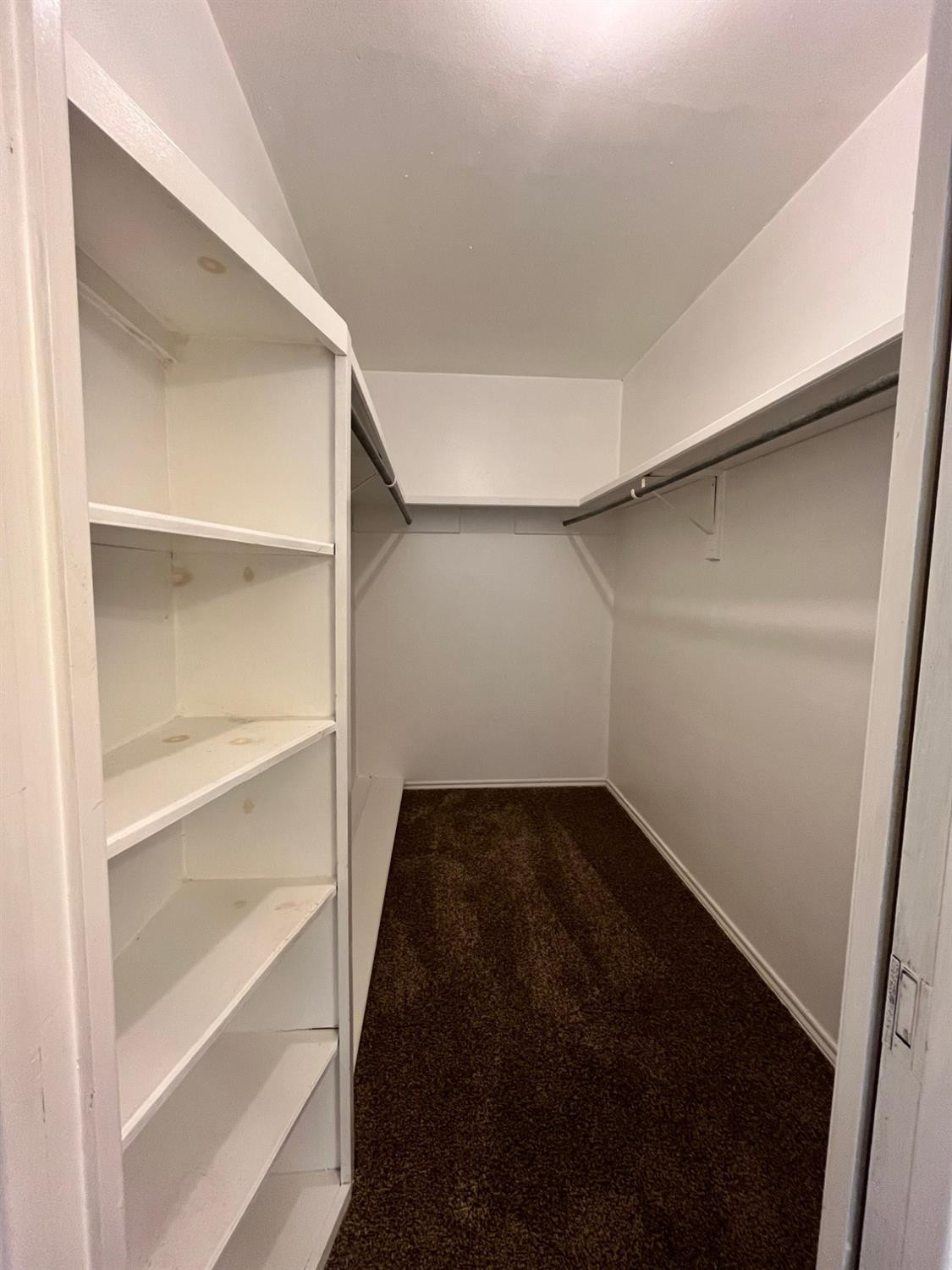 6305 Raleigh Avenue Lubbock, TX 79414 - Photo 9 of 19 a view of an empty walk in closet