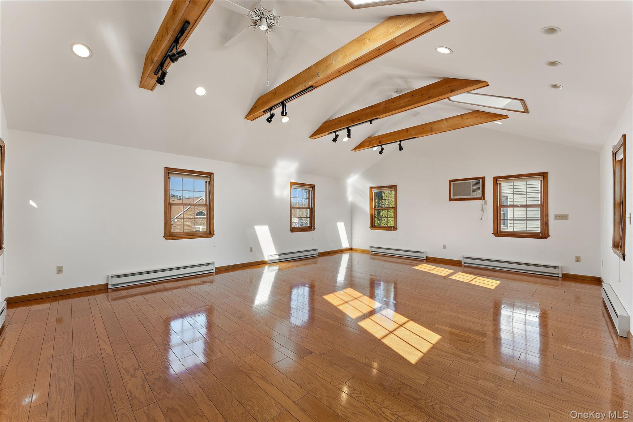 1 Hoover Road Yonkers, NY 10710 - Photo 16 of 50 a view of a living room with kitchen countertops and wooden floor