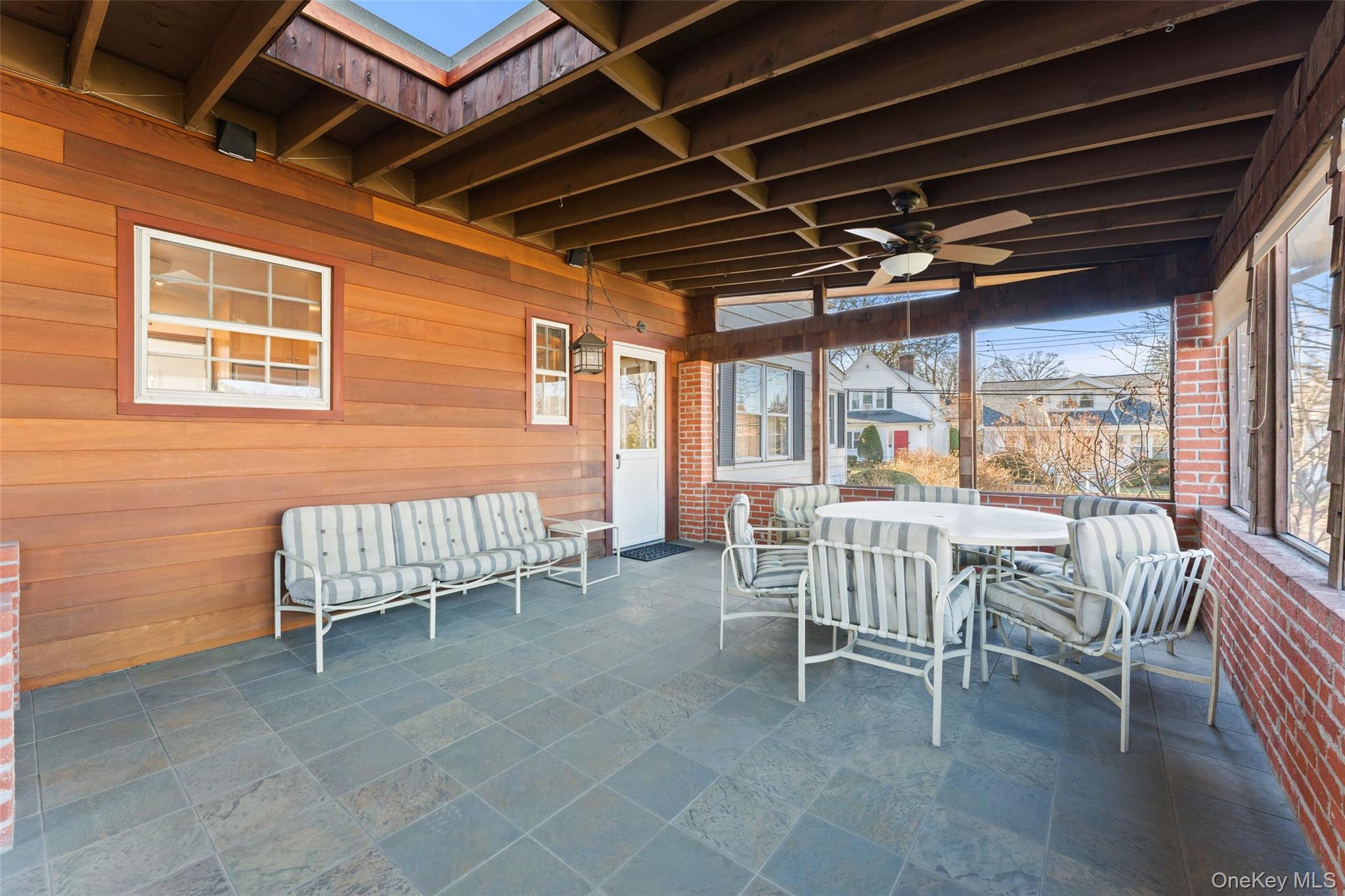 1 Hoover Road Yonkers, NY 10710 - Photo 22 of 50 a view of a patio with a table and chairs