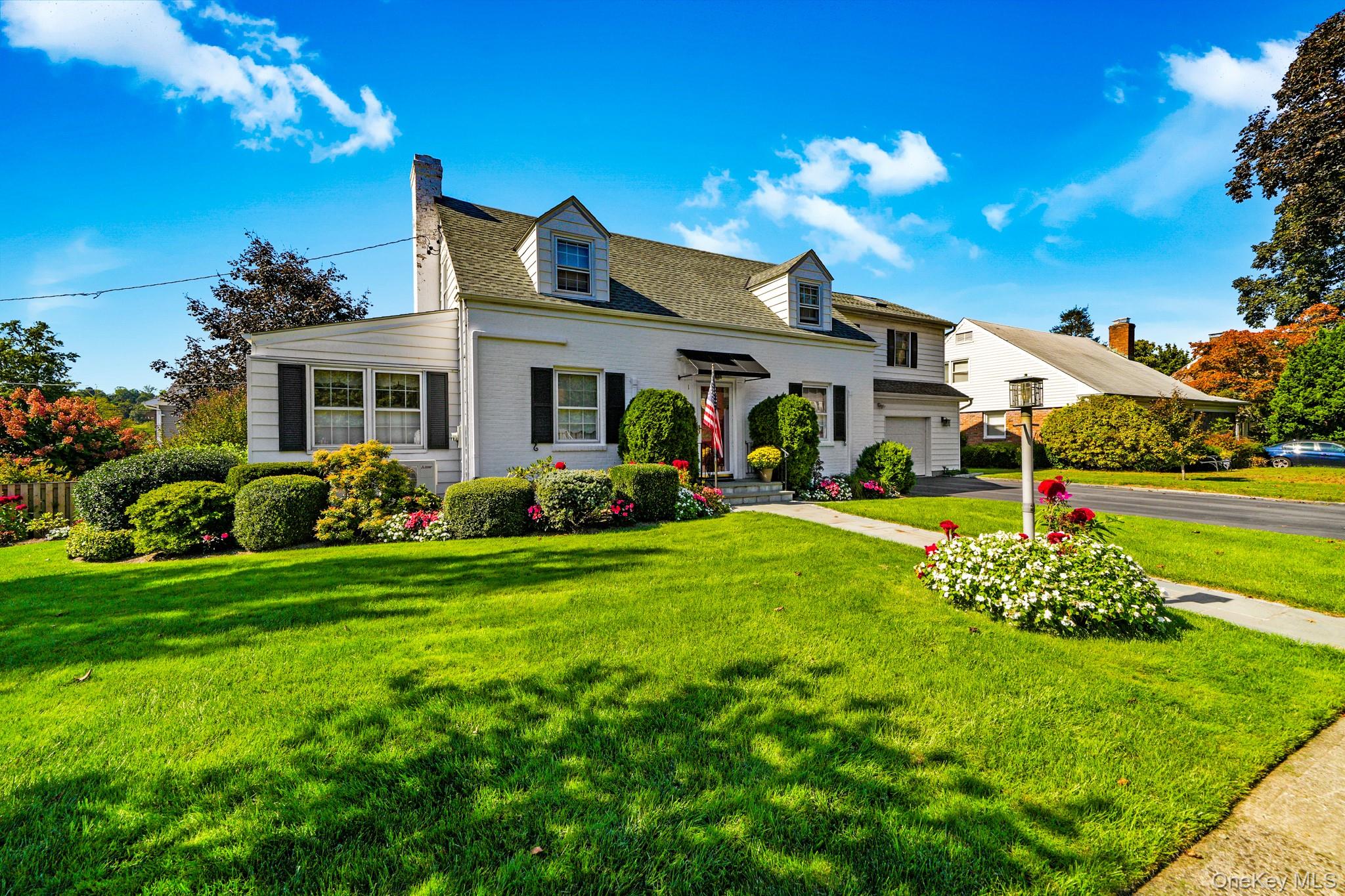 1 Hoover Road Yonkers, NY 10710 - Photo 26 of 50 a front view of a house with a yard