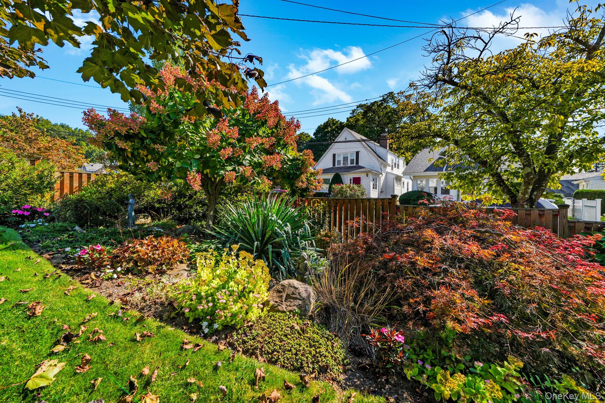 1 Hoover Road Yonkers, NY 10710 - Photo 36 of 50 a view of a garden with a fountain