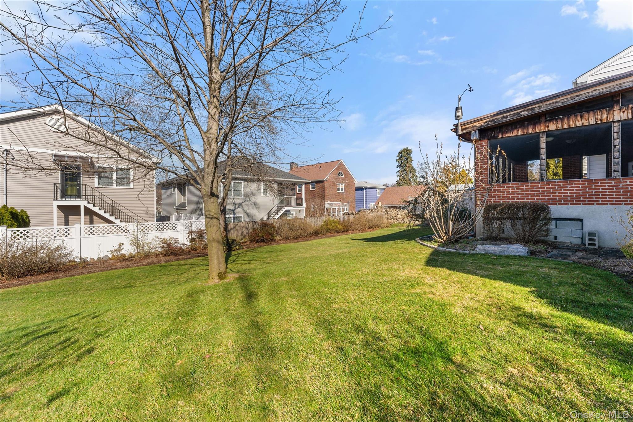 1 Hoover Road Yonkers, NY 10710 - Photo 38 of 50 a view of a house with a big yard and large tree