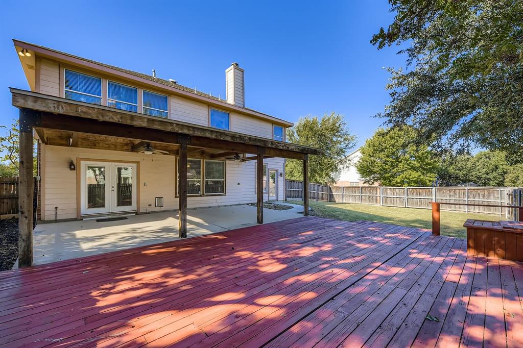 4201 Broken Bend Boulevard Fort Worth, TX 76244 - Photo 26 of 34 a front view of a house with a yard