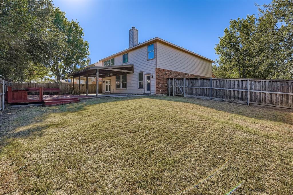 4201 Broken Bend Boulevard Fort Worth, TX 76244 - Photo 27 of 34 a view of a house with a yard and a large tree