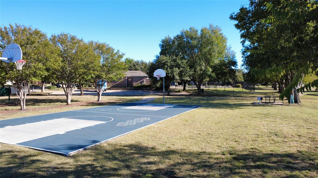 4201 Broken Bend Boulevard Fort Worth, TX 76244 - Photo 29 of 34 a view of a playground with basketball court