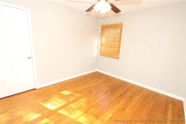 a view of a big room with windows