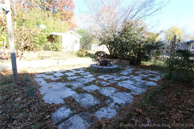 a view of back yard of the house