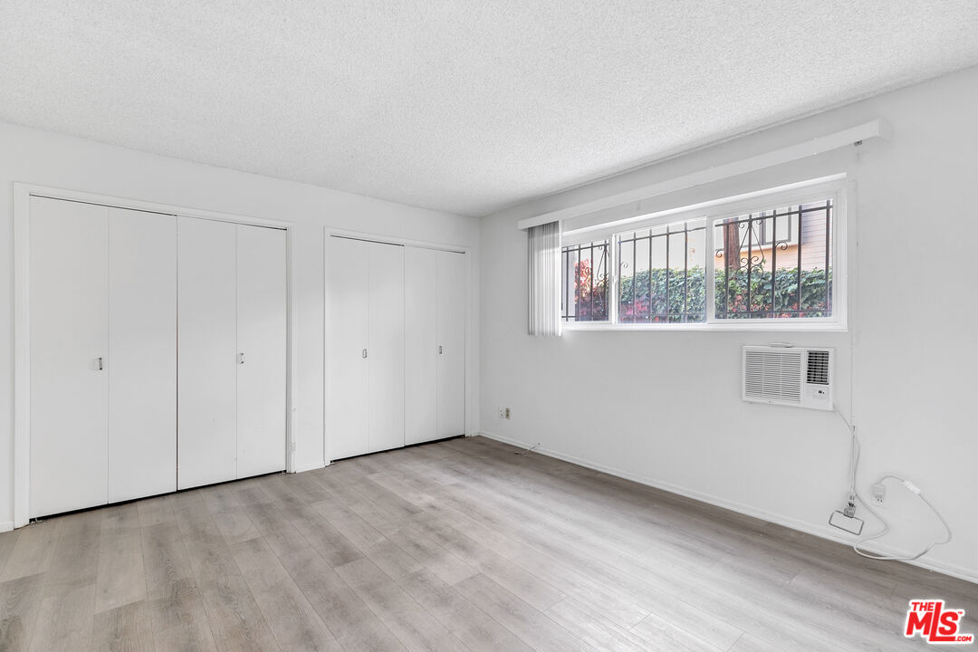1811 Parnell Avenue, Unit 3 Los Angeles, CA 90025 - Photo 13 of 20 a view of an empty room with a window