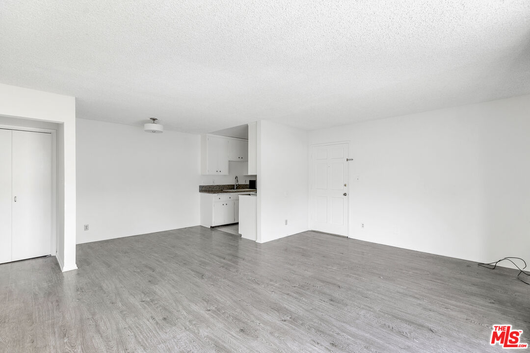 1811 Parnell Avenue, Unit 3 Los Angeles, CA 90025 - Photo 8 of 20 a view of empty room with wooden floor