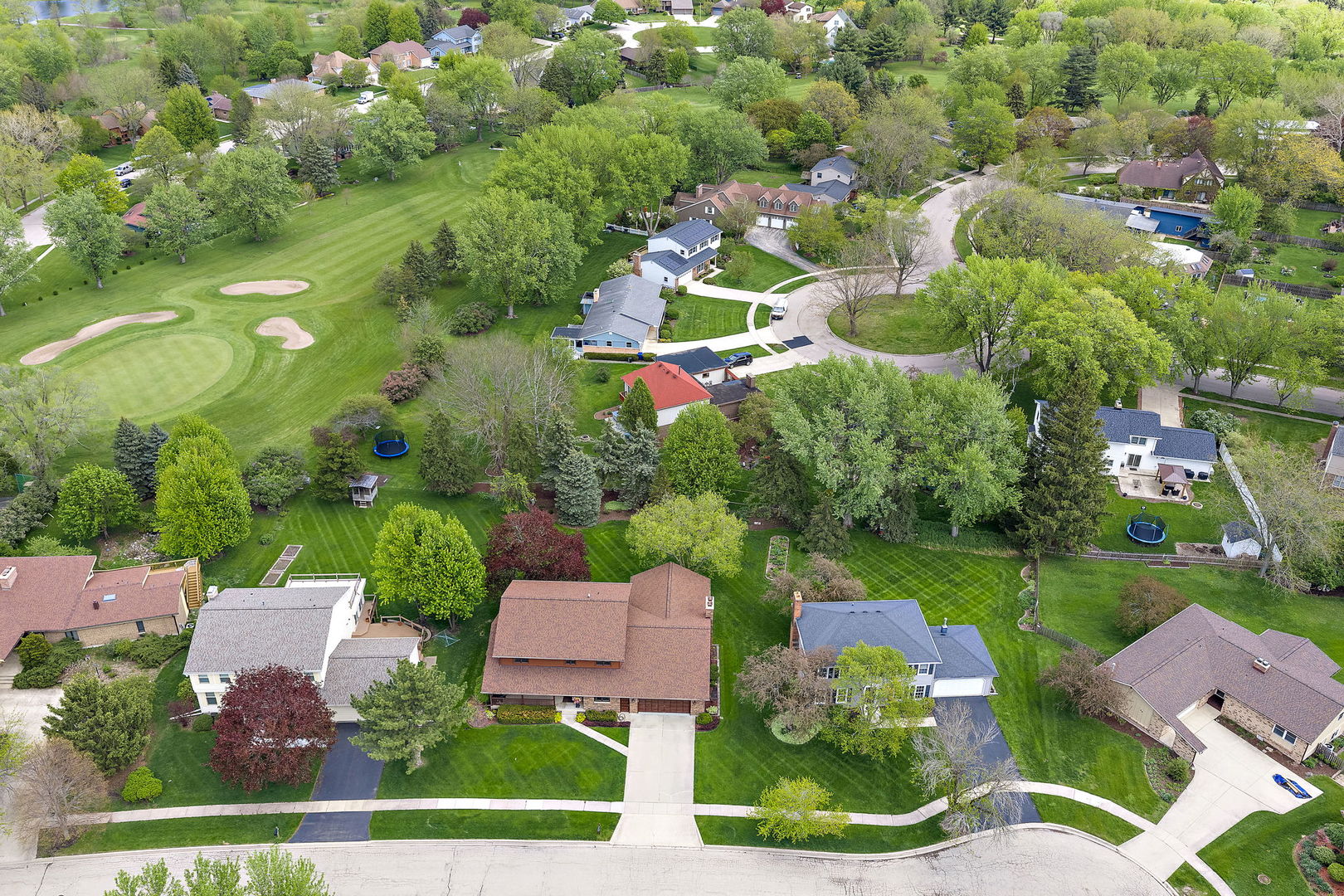 18 Jennifer Lane DeKalb, IL 60115 - Photo 39 of 48 an aerial view of residential houses with outdoor space and trees