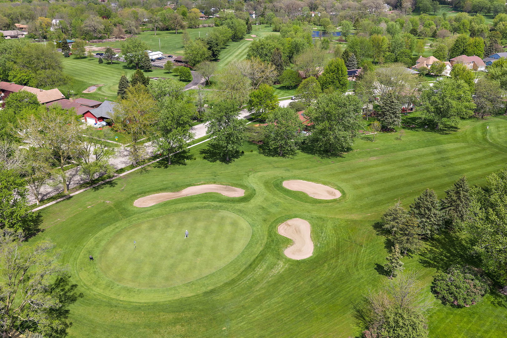 18 Jennifer Lane DeKalb, IL 60115 - Photo 41 of 48 a view of a golf course with a trees