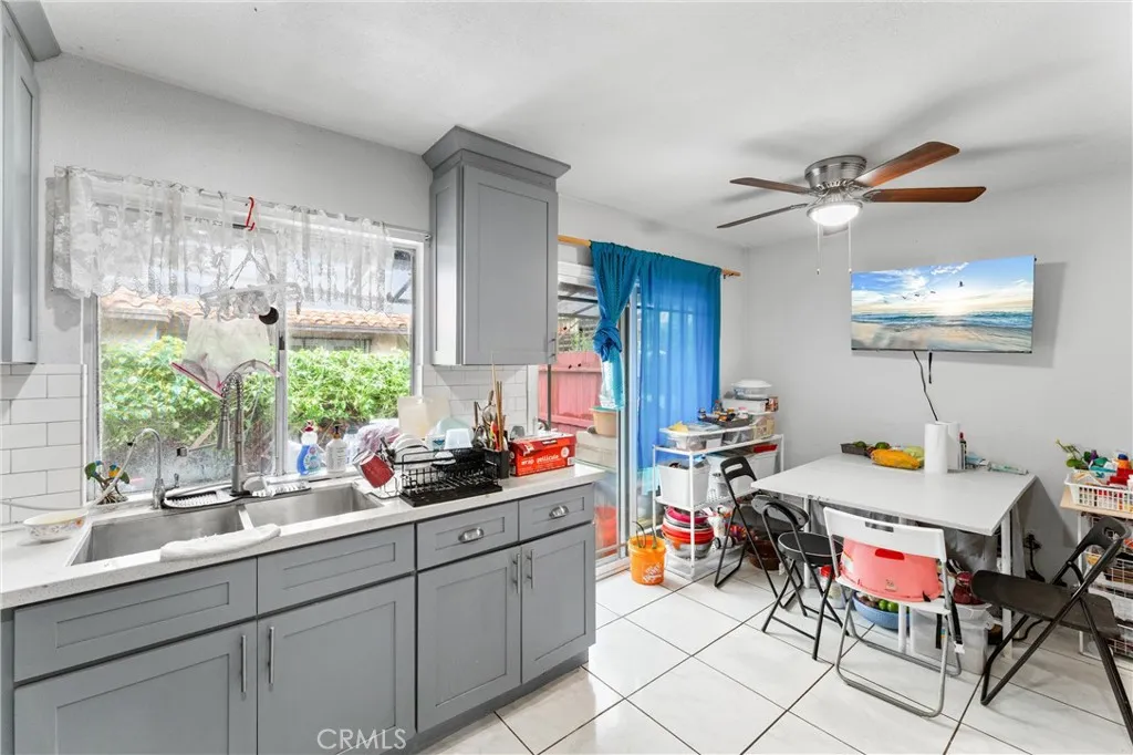 3927 West McFadden Avenue Santa Ana, CA 92704 - Photo 6 of 14 a kitchen with a sink and cabinets