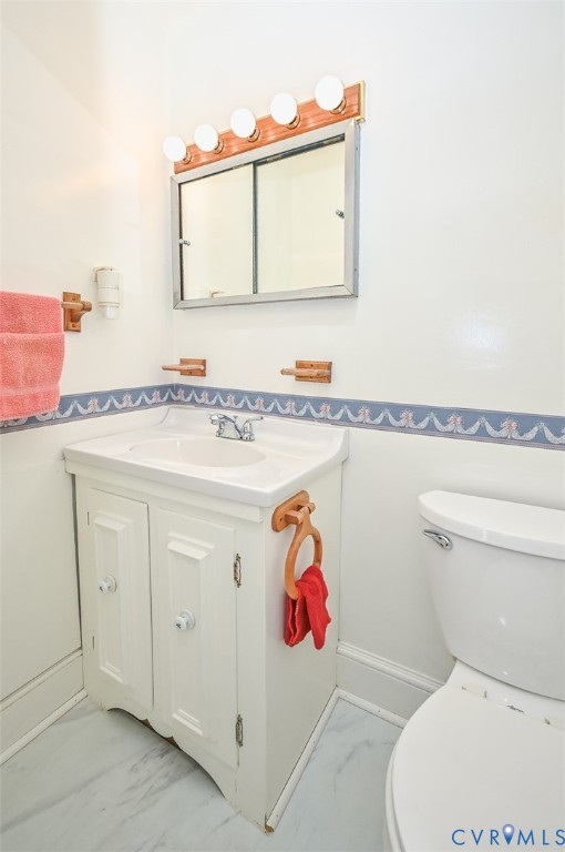620 Three Chopt Road Manakin-Sabot, VA 23103 - Photo 28 of 42 a bathroom with a toilet sink and mirror