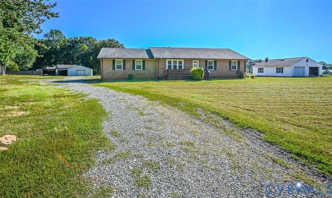 620 Three Chopt Road Manakin-Sabot, VA 23103 - Photo 3 of 42 a view of a residential houses with yard and ocean view