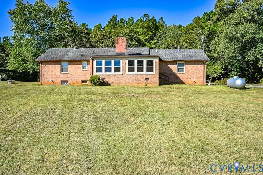 620 Three Chopt Road Manakin-Sabot, VA 23103 - Photo 39 of 42 a view of a house with a yard