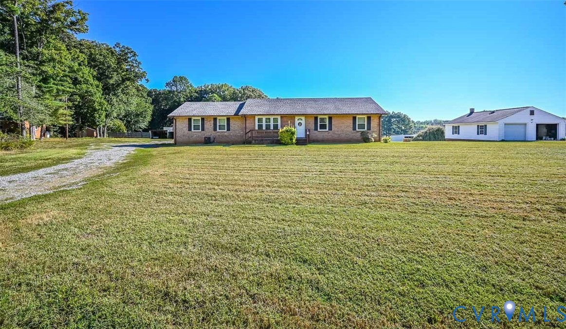 620 Three Chopt Road Manakin-Sabot, VA 23103 - Photo 4 of 42 a view of a house with a yard