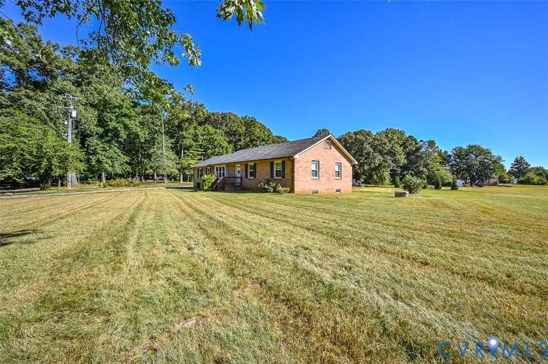 620 Three Chopt Road Manakin-Sabot, VA 23103 - Photo 5 of 42 a view of swimming pool with an outdoor space and seating area