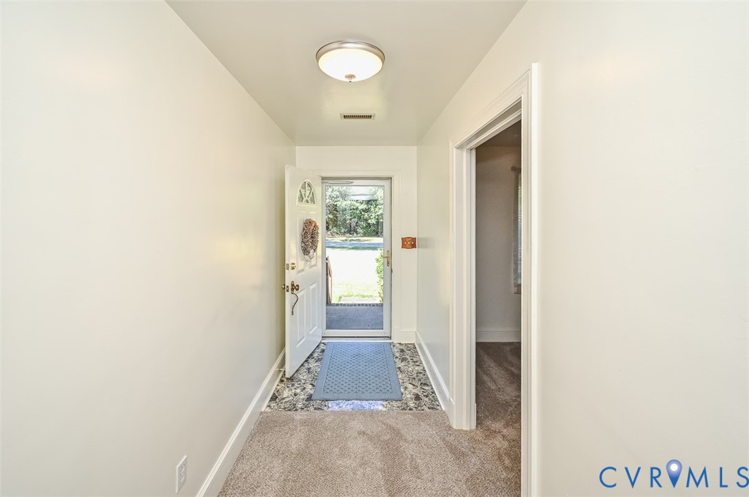 620 Three Chopt Road Manakin-Sabot, VA 23103 - Photo 6 of 42 a view of a hallway with a white walls