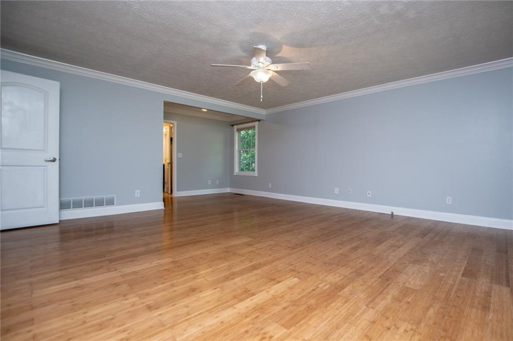 8291 Highway 5 Winston, GA 30187 - Photo 34 of 65 a view of an empty room with wooden floor
