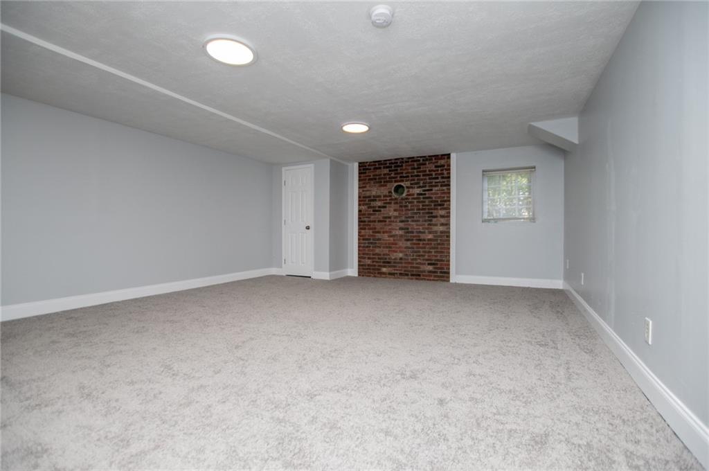 8291 Highway 5 Winston, GA 30187 - Photo 53 of 65 an empty room with a empty space and windows