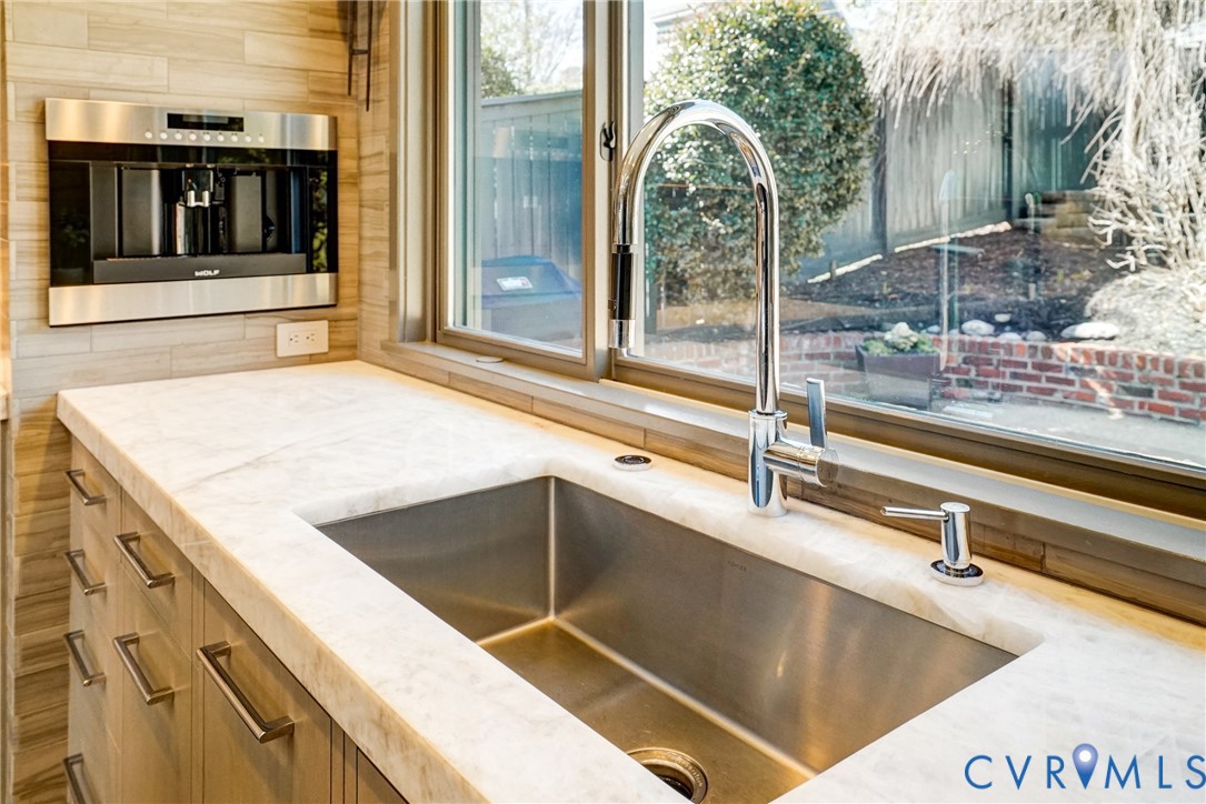 4902 Riverside Drive Richmond, VA 23225 - Photo 12 of 69 Kitchen with Quartzite counters overlooks a landsc