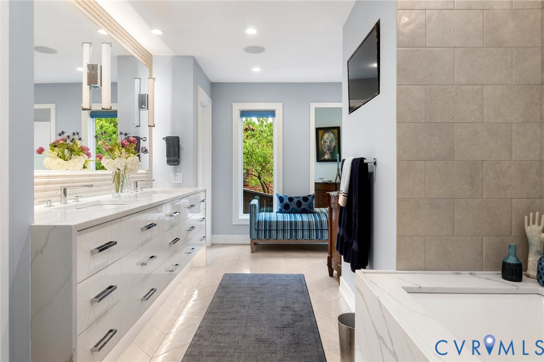 4902 Riverside Drive Richmond, VA 23225 - Photo 25 of 69 Primary Bathroom with custom cabinetry, soaking tu