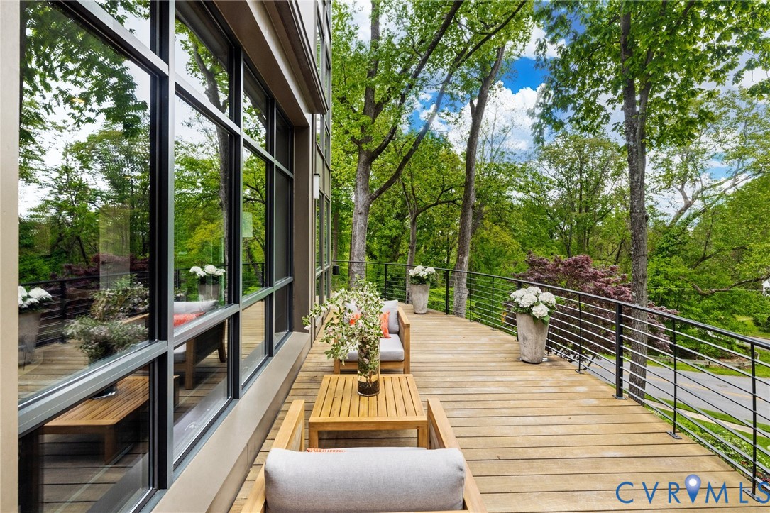 4902 Riverside Drive Richmond, VA 23225 - Photo 30 of 69 Front deck wraps around living & dining rooms over