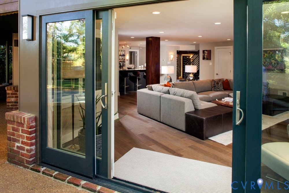 4902 Riverside Drive Richmond, VA 23225 - Photo 54 of 69 Basement Sliding doors invite you outdoors from th