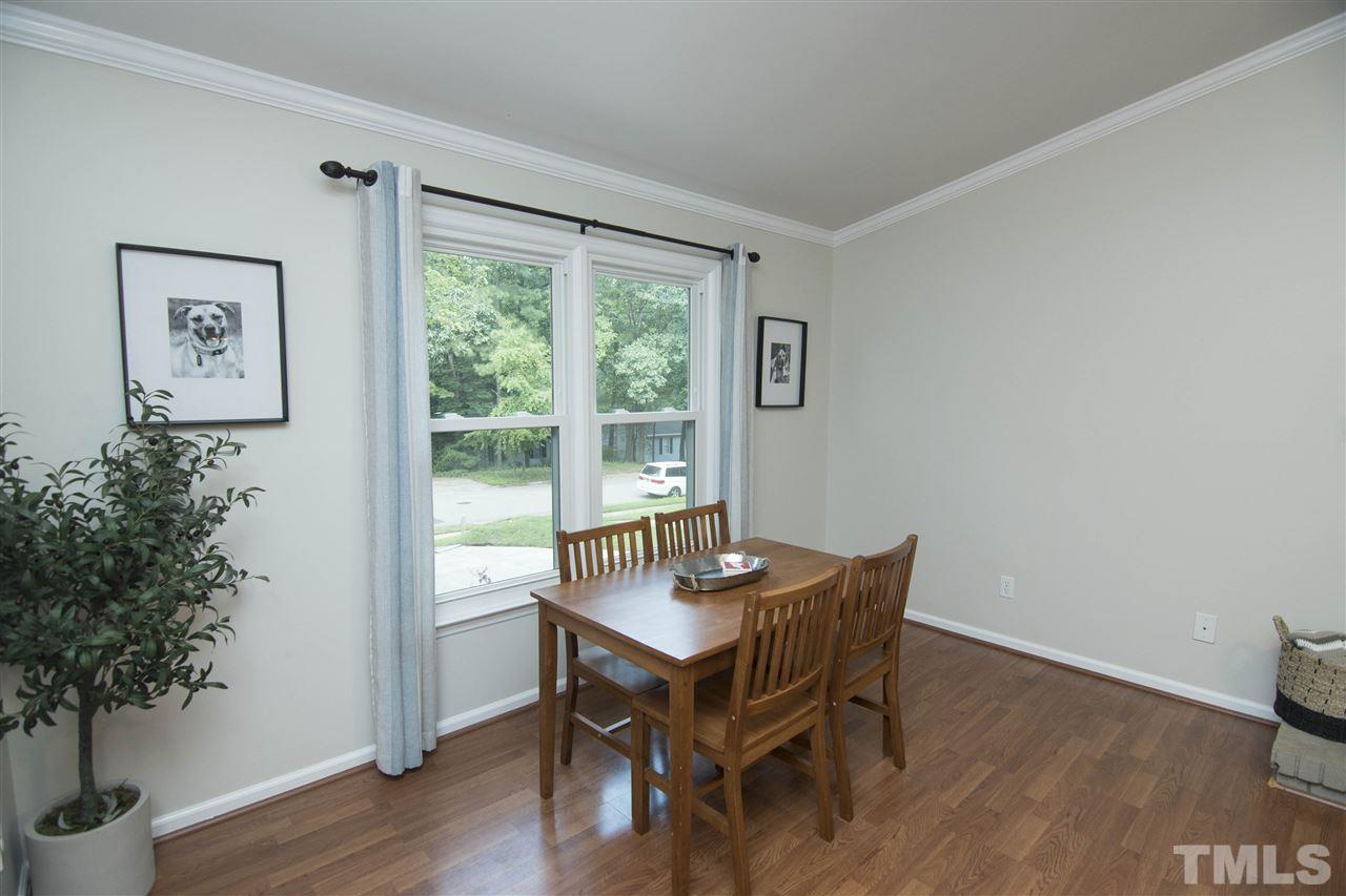 7408 Post Oak Road Raleigh, NC 27615 - Photo 16 of 27 a view of a workspace with furniture and a window