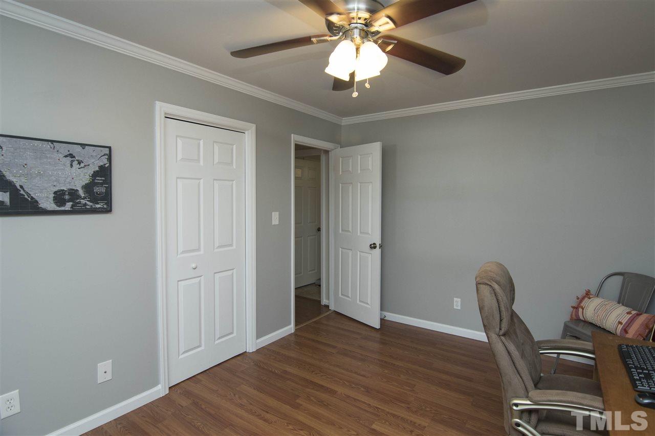 7408 Post Oak Road Raleigh, NC 27615 - Photo 21 of 27 a view of workspace with wooden floor