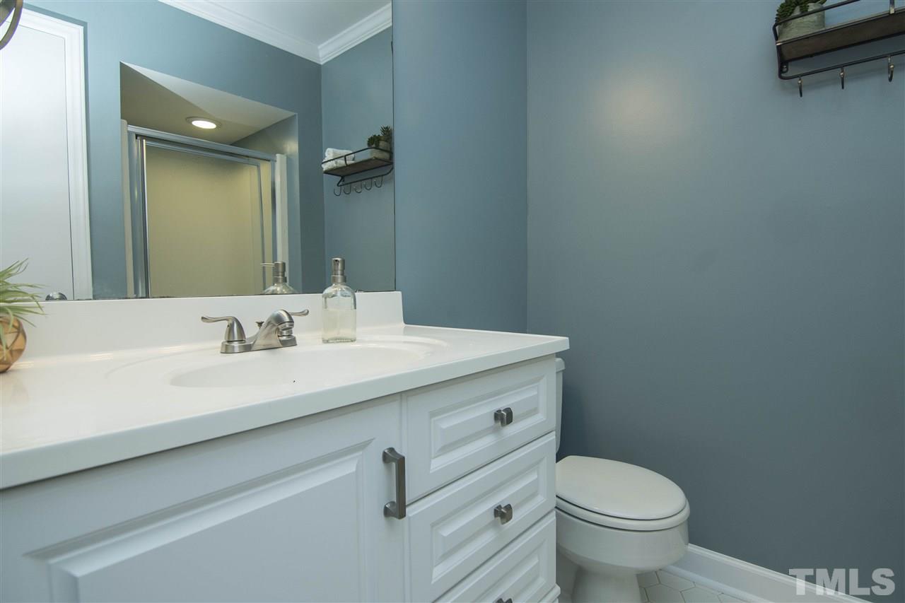 7408 Post Oak Road Raleigh, NC 27615 - Photo 27 of 27 a bathroom with a sink and a toilet