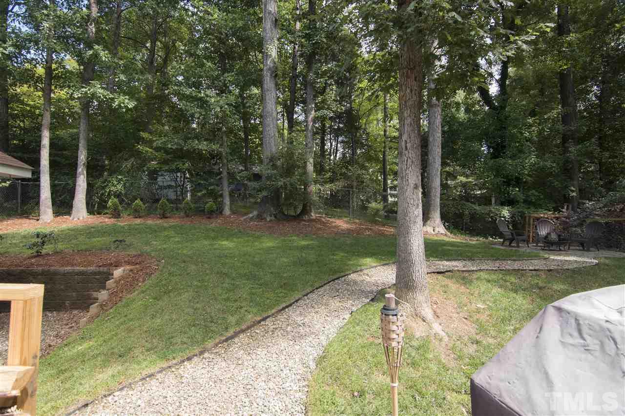 7408 Post Oak Road Raleigh, NC 27615 - Photo 6 of 27 a view of a park with a tree