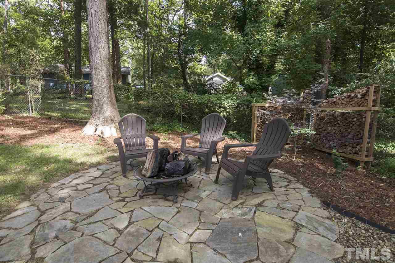 7408 Post Oak Road Raleigh, NC 27615 - Photo 7 of 27 a view of a patio with chairs and plants