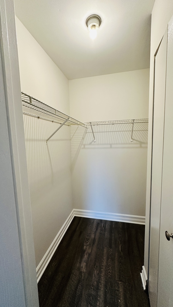 2014 North Rand Road, Unit 108 Palatine, IL 60074 - Photo 16 of 16 a view of a room with racks on the wall