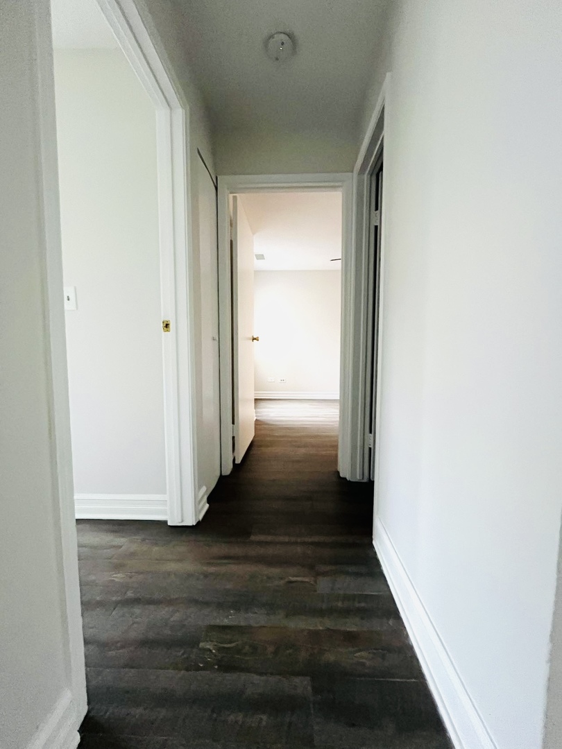 2014 North Rand Road, Unit 108 Palatine, IL 60074 - Photo 9 of 16 a view of gallery with wooden floor