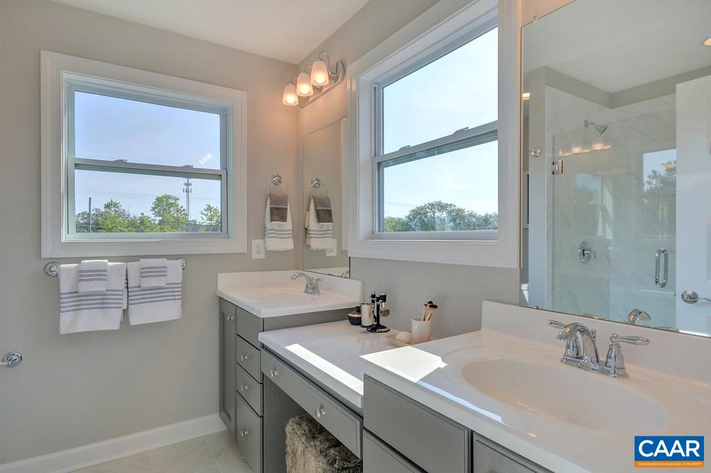 133 Junction Lane Charlottesville, VA 22902 - Photo 13 of 24 a bathroom with a sink and a window