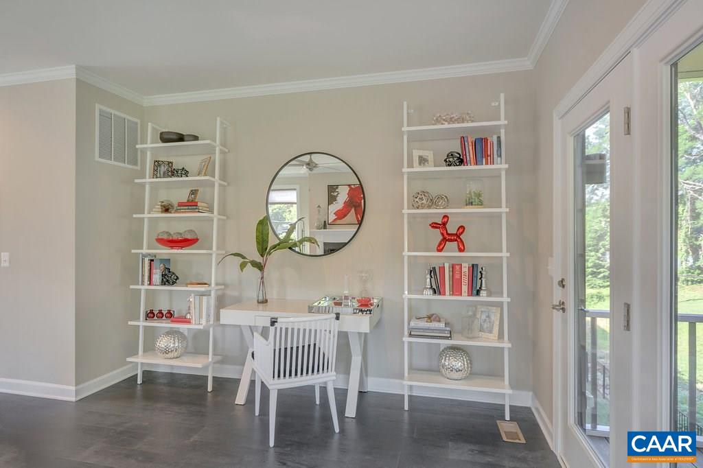133 Junction Lane Charlottesville, VA 22902 - Photo 8 of 24 a living room with baby cabinets and a wooden floor
