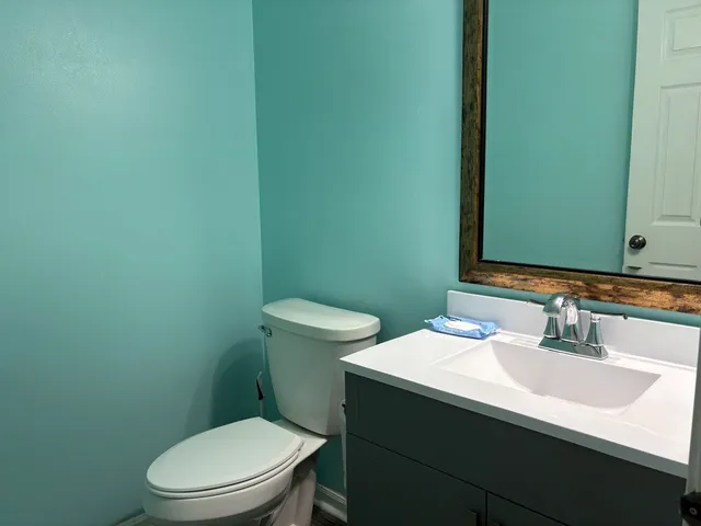a bathroom with a sink and a toilet