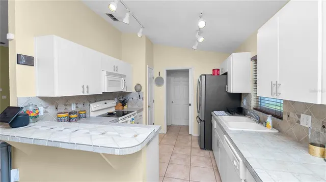 a very nice looking dining room with a couch