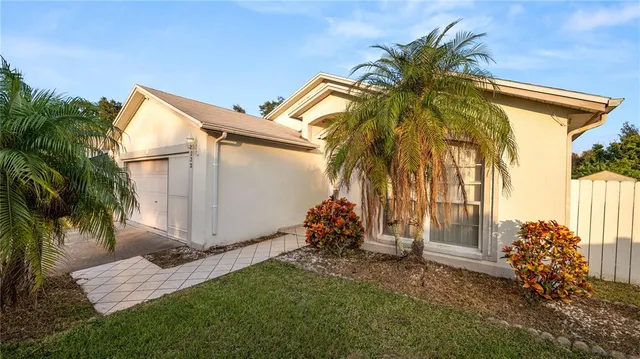 a view of a backyard with a small cabin
