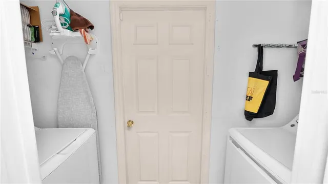 a bathroom with a shower and mirror