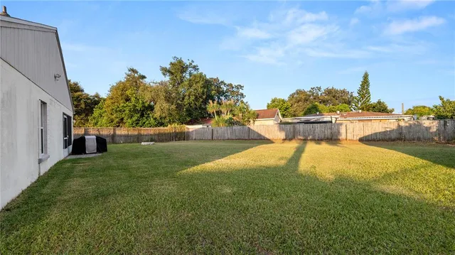 a view of a swimming pool with an outdoor seating