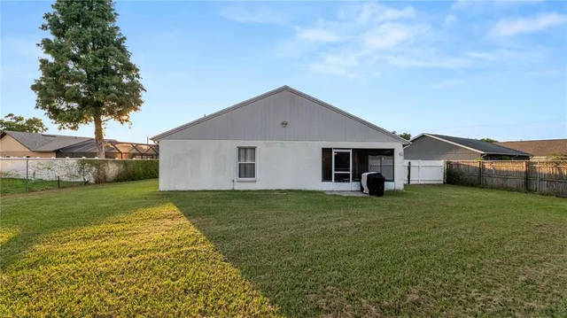 a view of a backyard with a garden