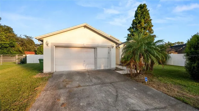 a view of backyard of a house