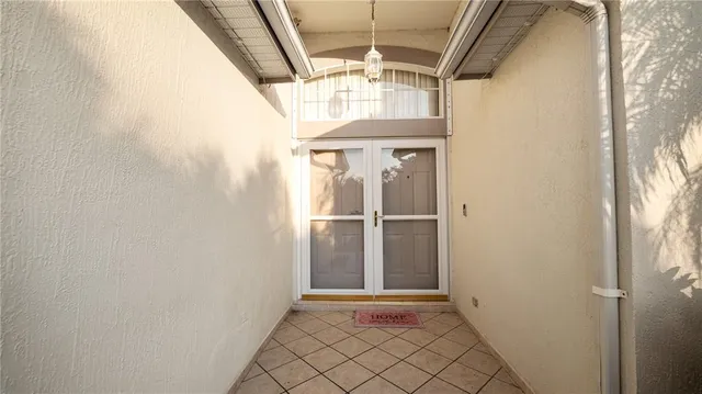 a view of entryway with wooden walls