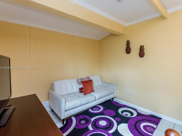 a bathroom with a toilet a sink and a shower