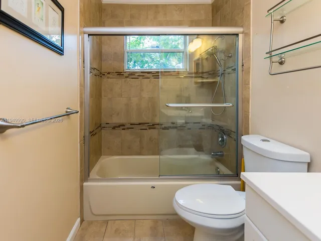 a view of a house with swimming pool and a yard