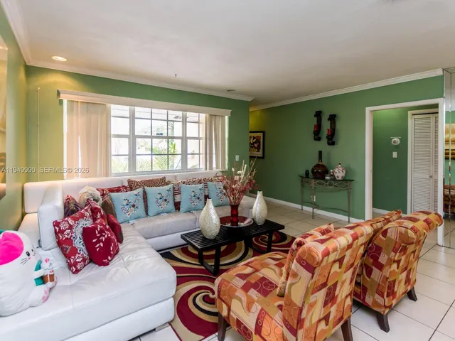 a living room with furniture and window