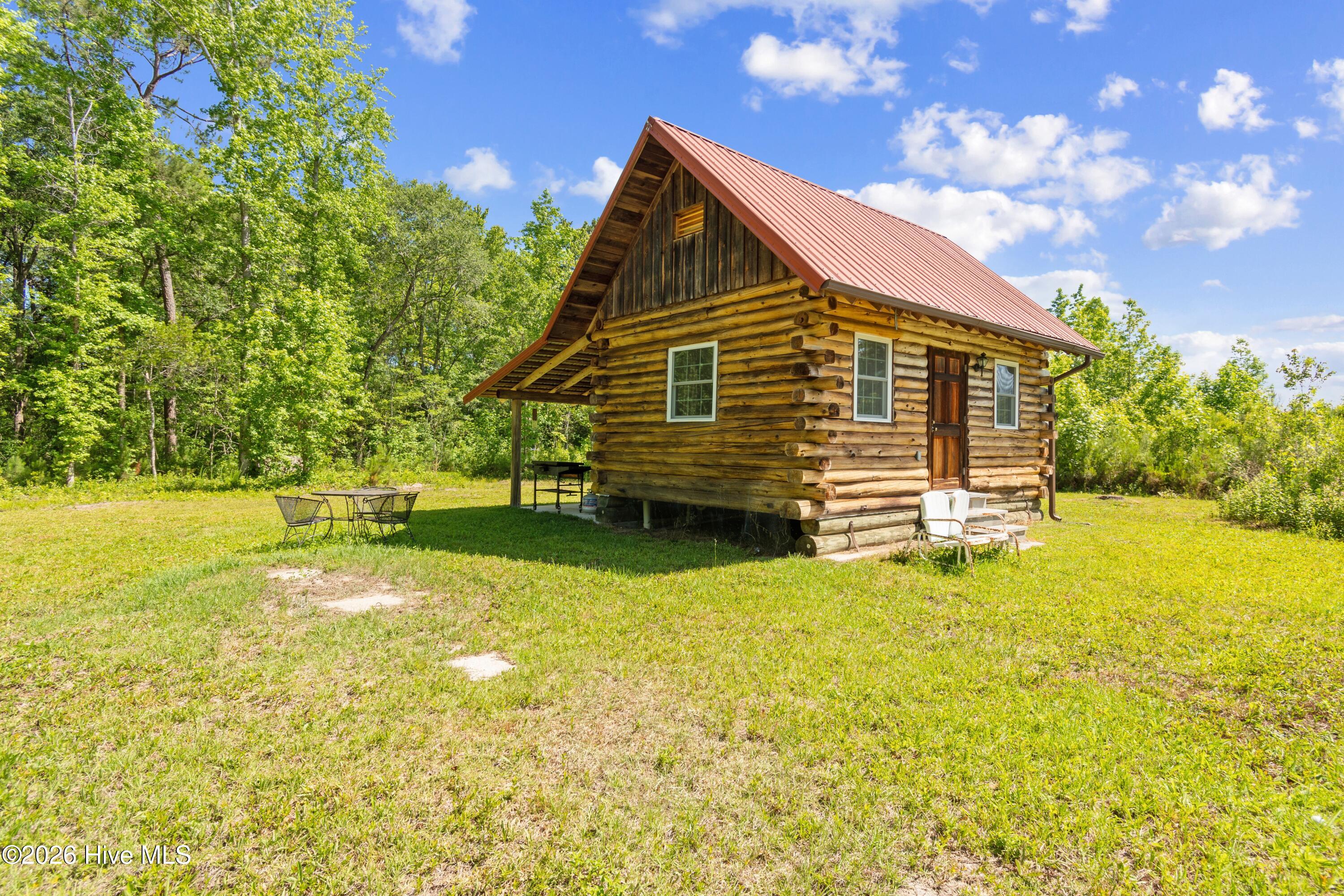 5840 Green Swamp Road Northwest Ash, NC 28420 - Photo 22 of 64 Rear of Cabin