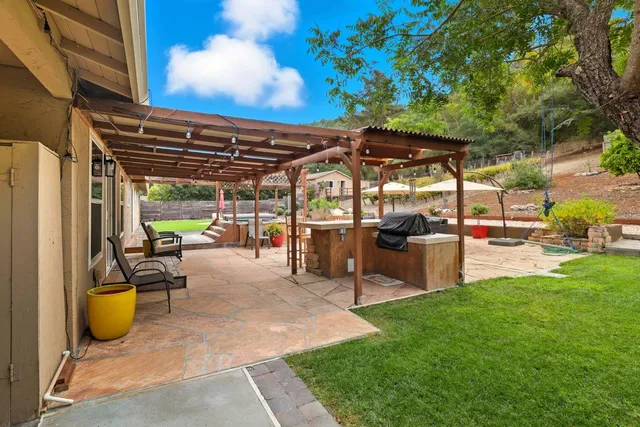 a view of a house with a big yard